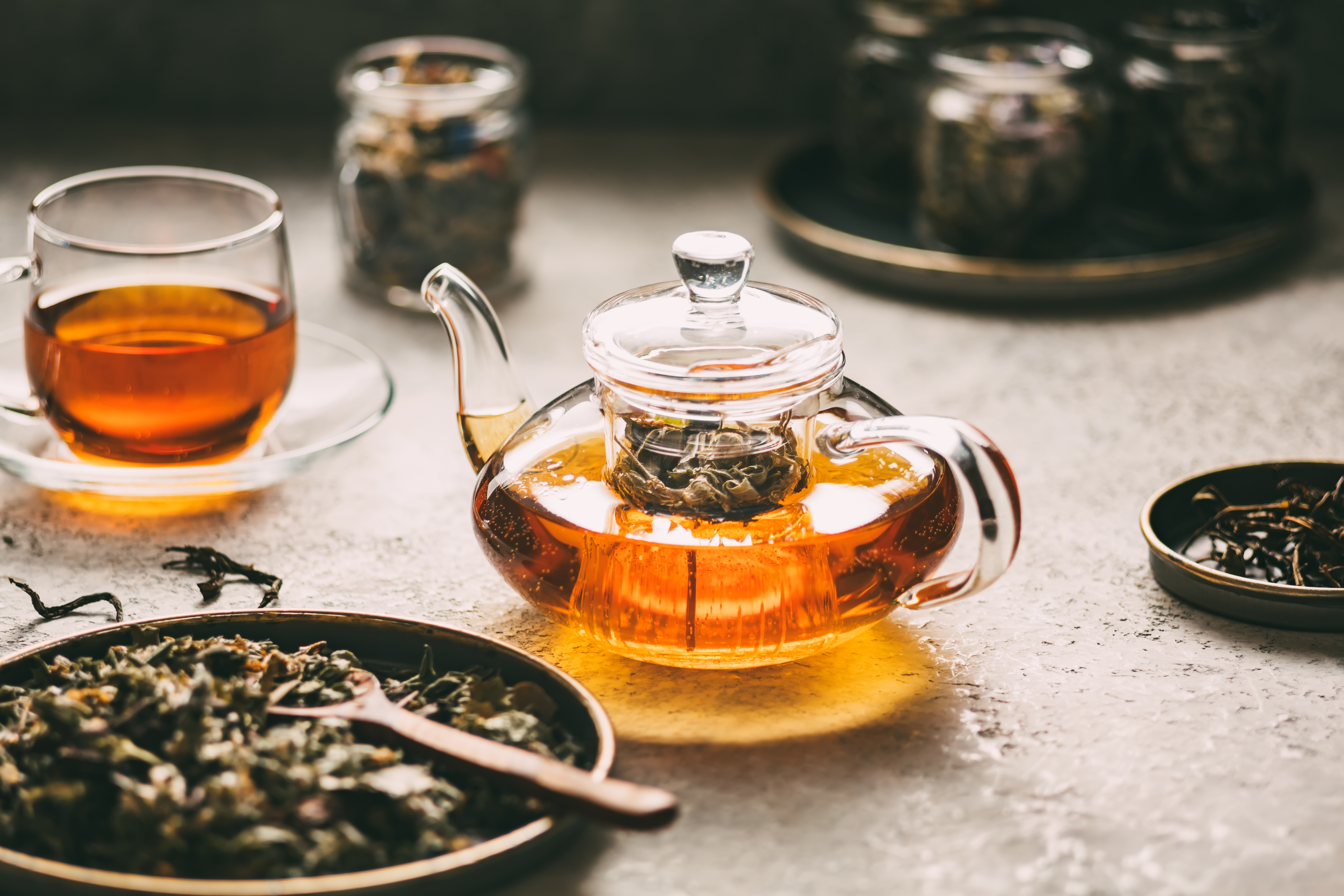 Teapot with fresh tea from different herbs